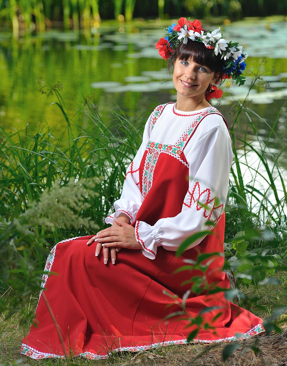 Beautiful girl Girls in Slavic costumes in Ngerulmud